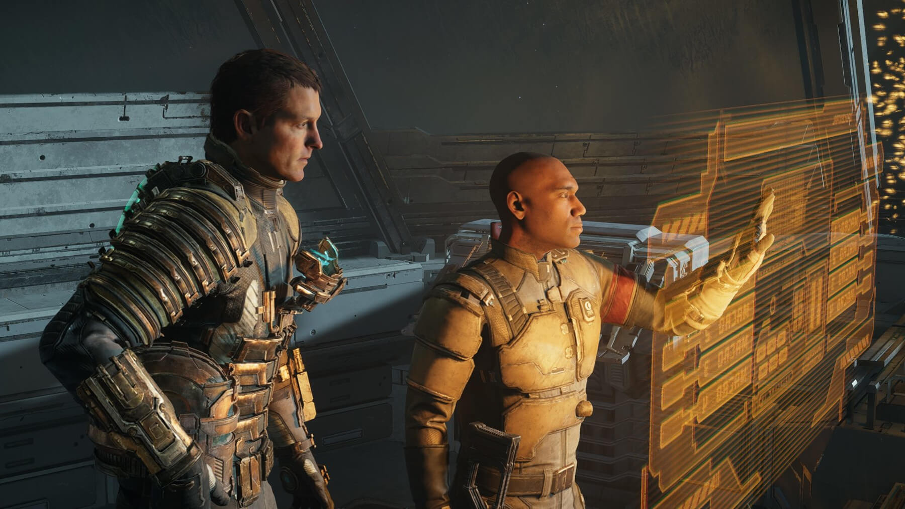 Two male characters in futuristic attire look at a holographic computer terminal.