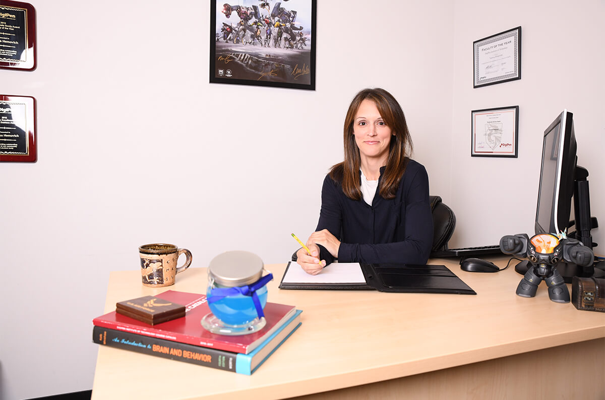 Assistant Dean of Faculty Development, Vanessa Hemovich, pictured in her office.