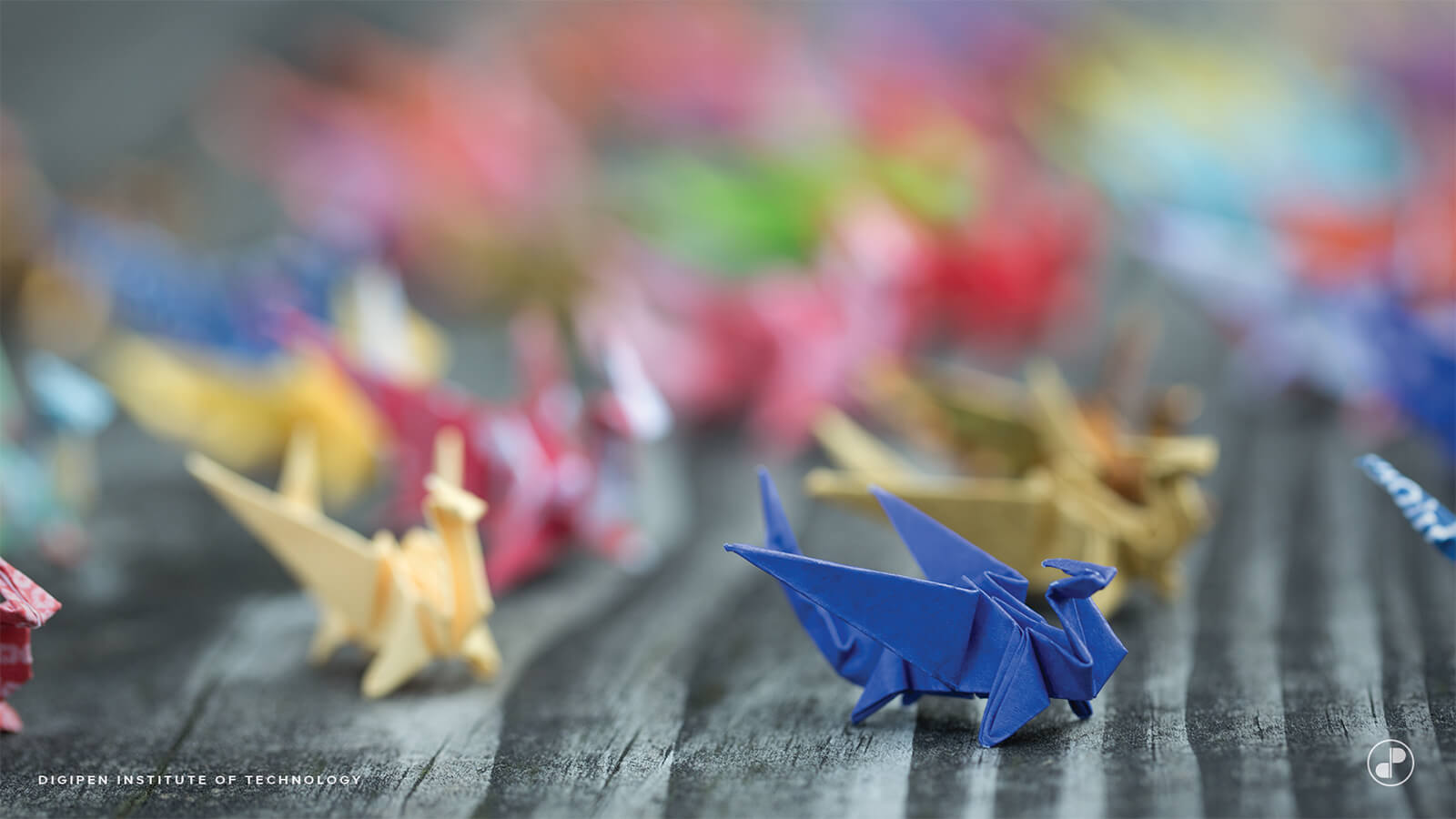 An army of folded paper origami dragons in a natural setting