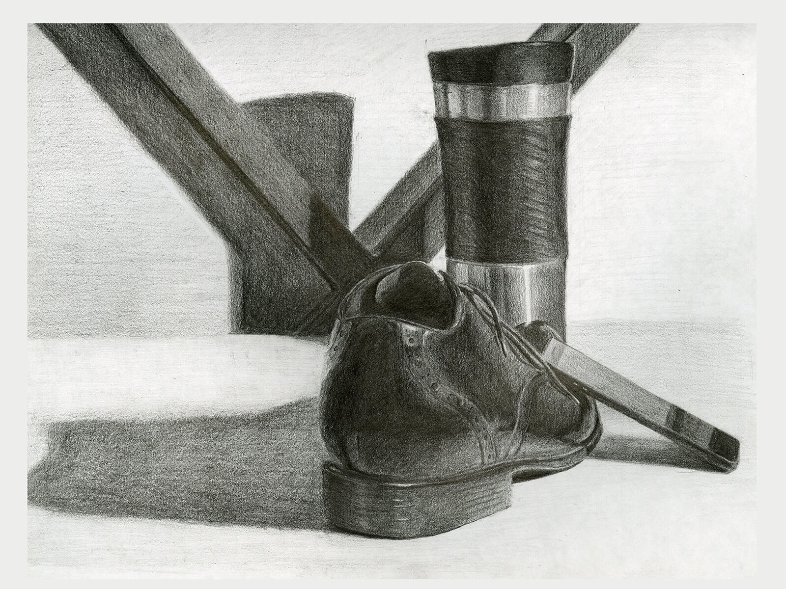 black and white still-life drawing of a travel coffee mug and man's dress shoe