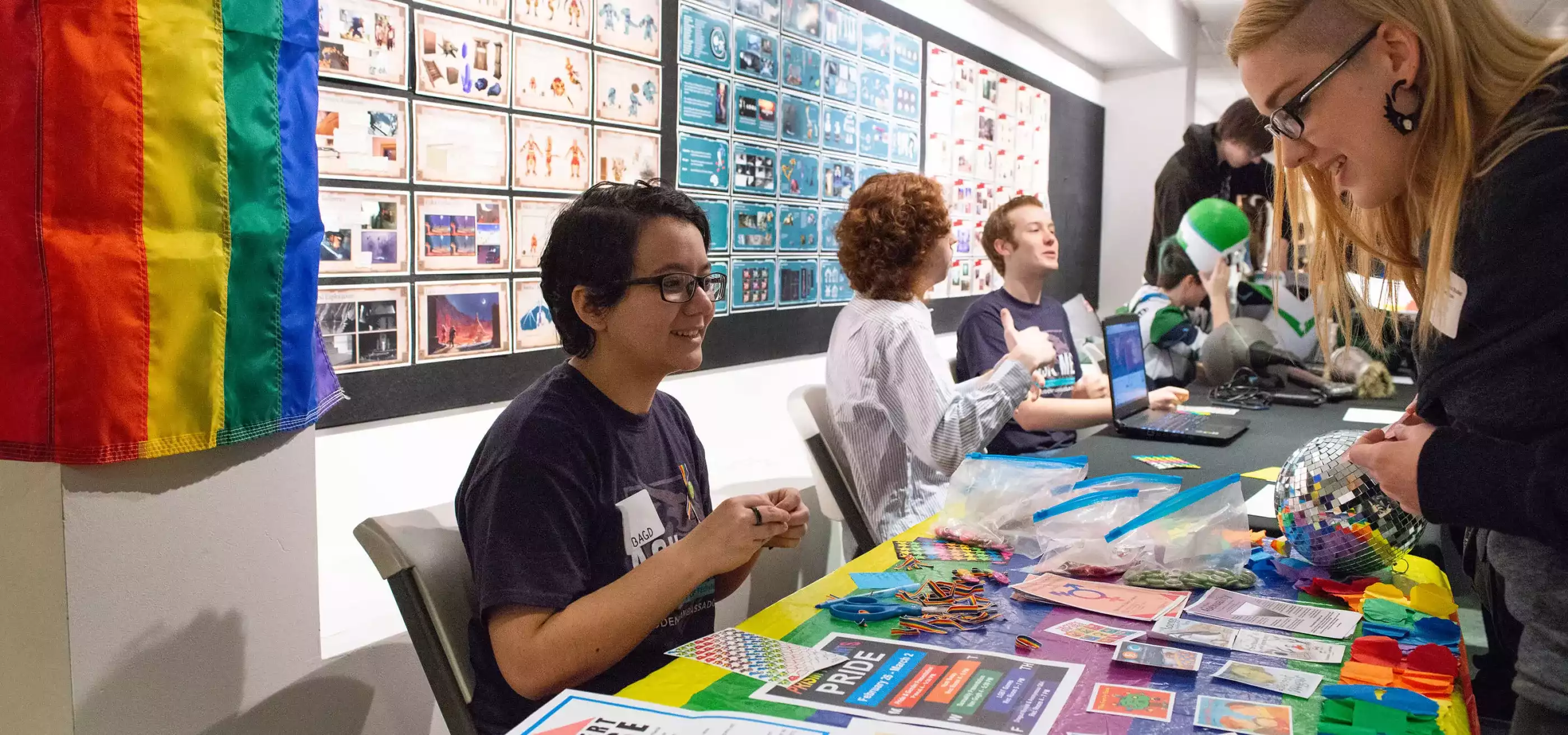A DigiPen student explaining Pride Club, the student-run LGBTQA Club and Gay-Straight Alliance club