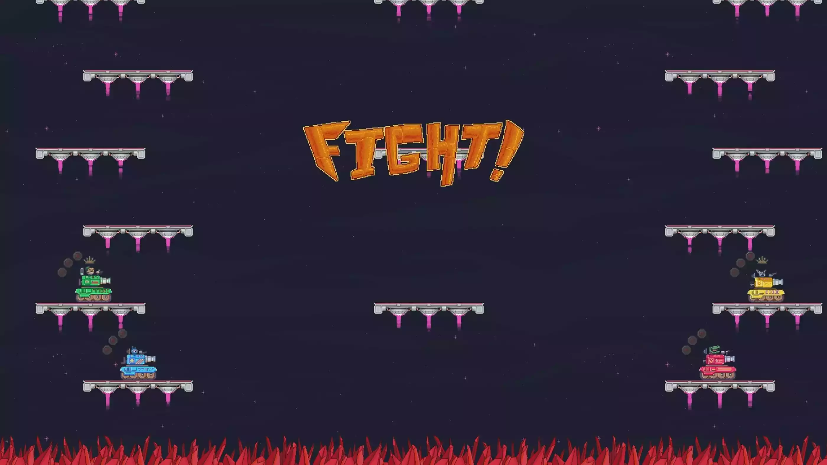 A green, yellow, blue and red tank stand at the ready on platforms, the word "FIGHT!" in the foreground.