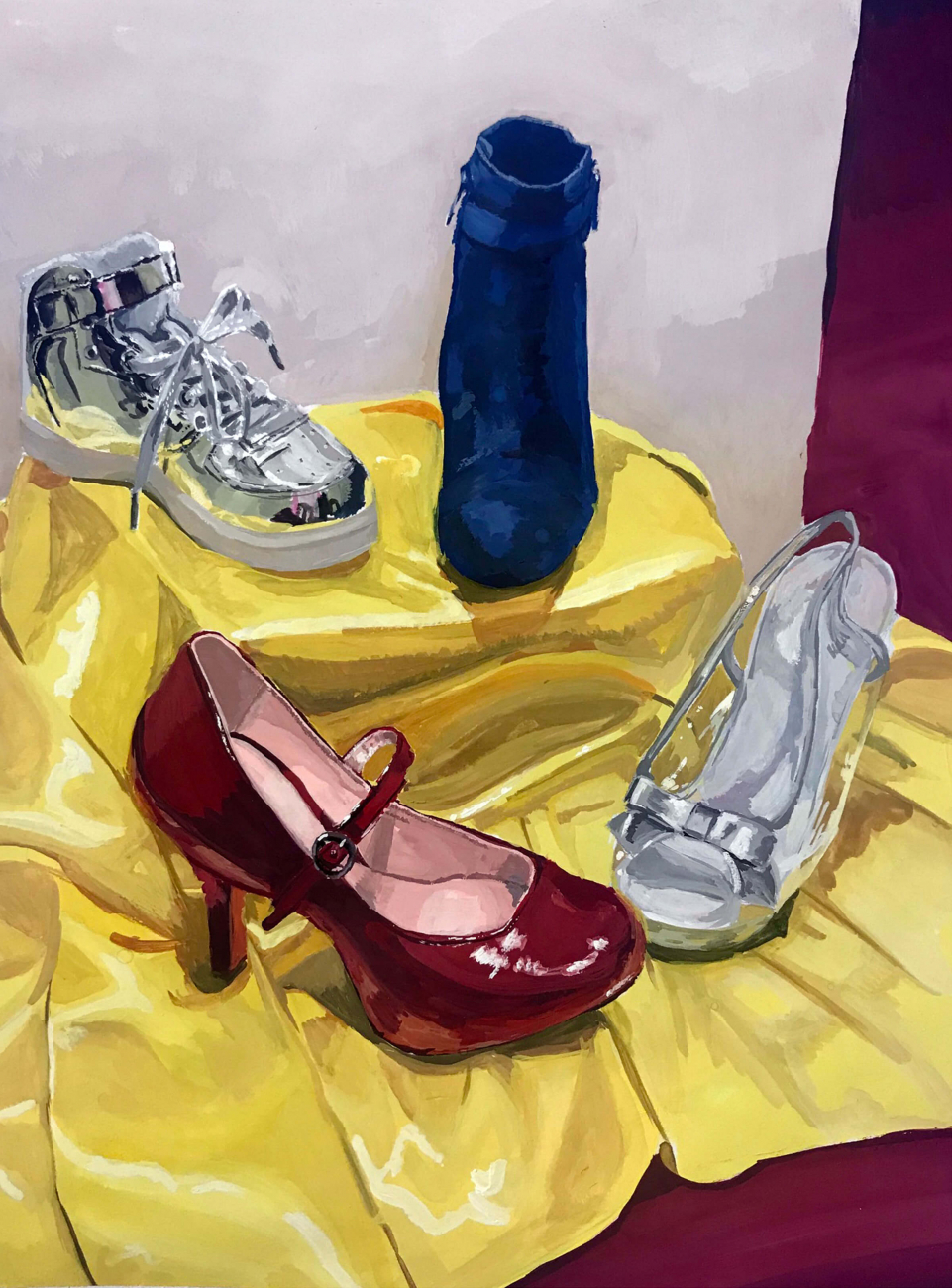 Various shoes, including high-heeled red and sliver, on a yellow cloth
