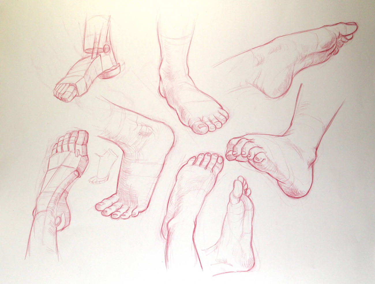 various drawings of feet